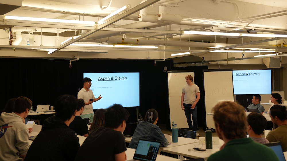 Aspen and Steven teaching a group at Northwestern’s The Garage